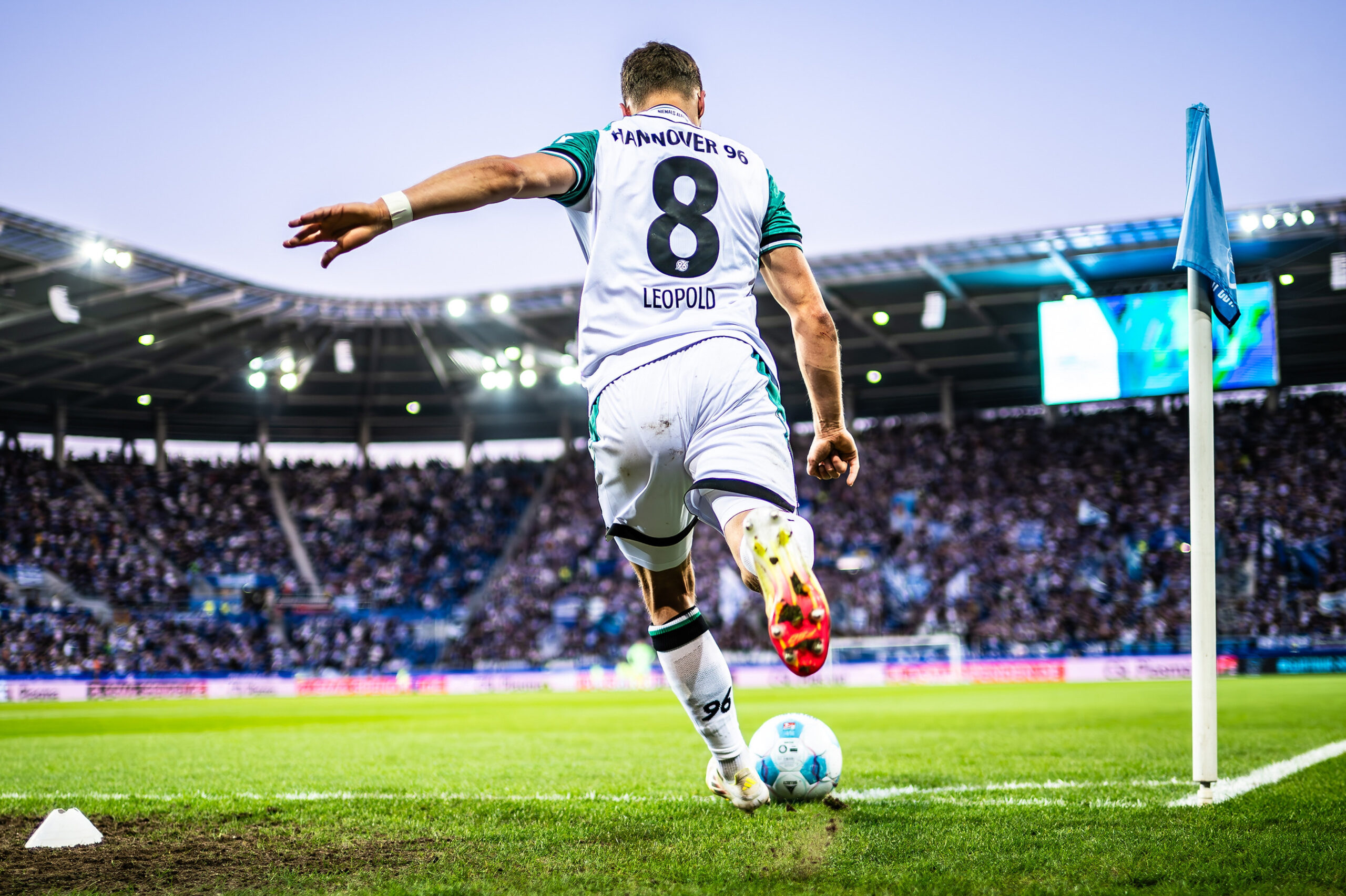 Sportfotograf am Spielfeldrand